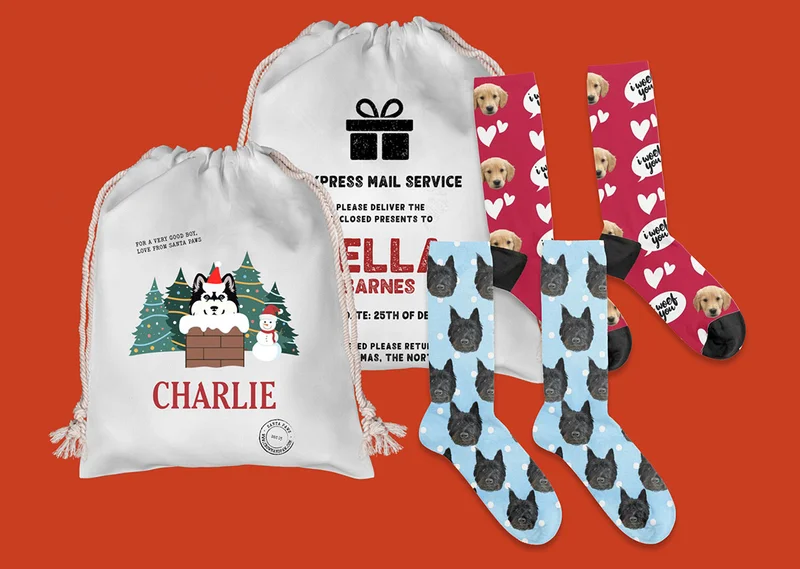 2 pairs of socks and 2 santa sacks photo