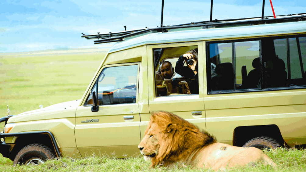 Image description: People on safari in Tanzania.
