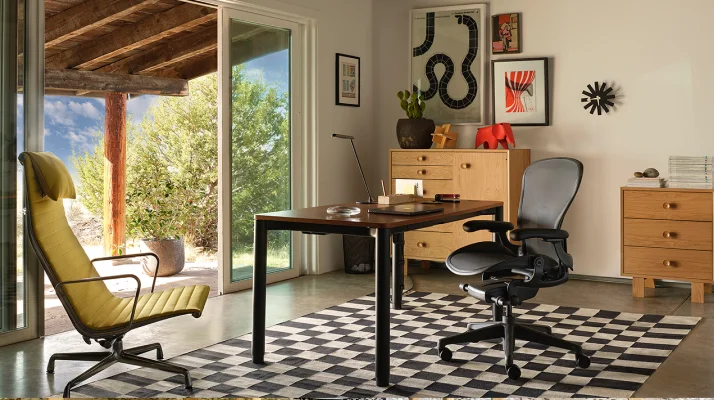 Spout table with Aeron chair in a sunny Architectual home office.