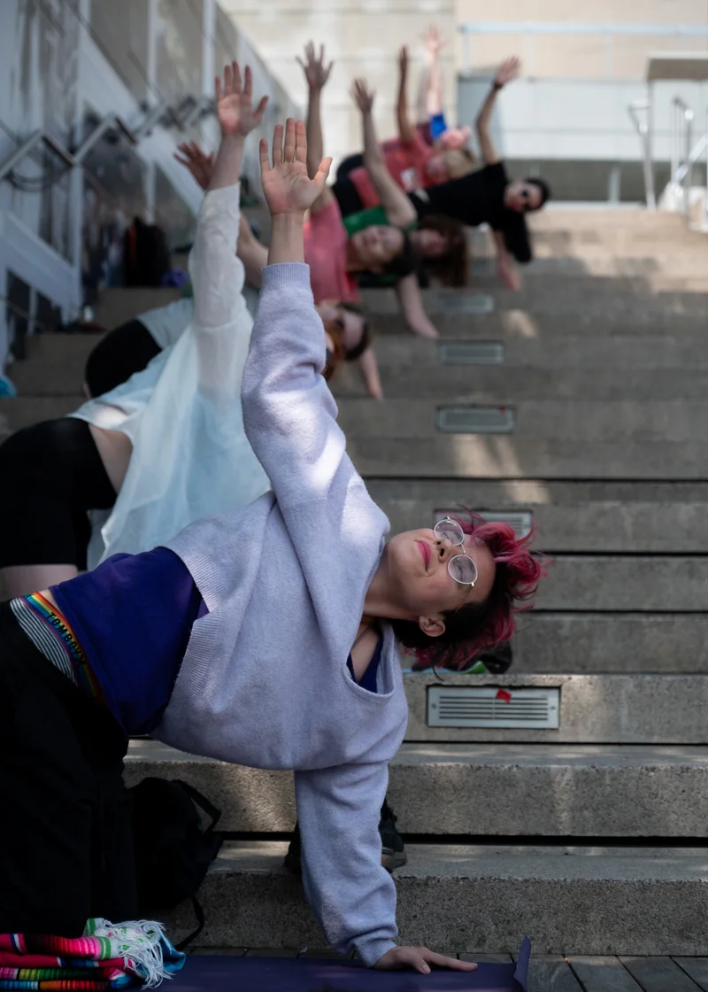 People doing outdoor yoga