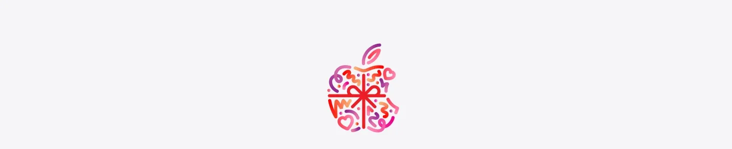 Dots, squiggles, and hearts in red, pink, and purple colors burst and spread across from behind Apple logo, wrapped in a red color bow, made up of dots, squiggles, and hearts in different hues of red, pink, and purple