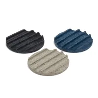 Three ceramic coasters and more from Ace Hotel Shop's home collection, showcased in a dynamic rotation.