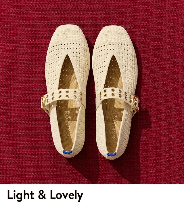 A woman wearing cream mary janes.
