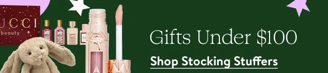 A fragrance set, lip gloss and stuffed rabbit.