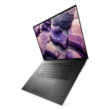 A Dell laptop computer suspended in midair.