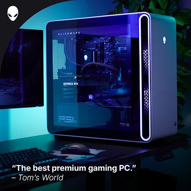 An Alienware Area-51 Gaming Desktop computer in a dramatically lit home office.