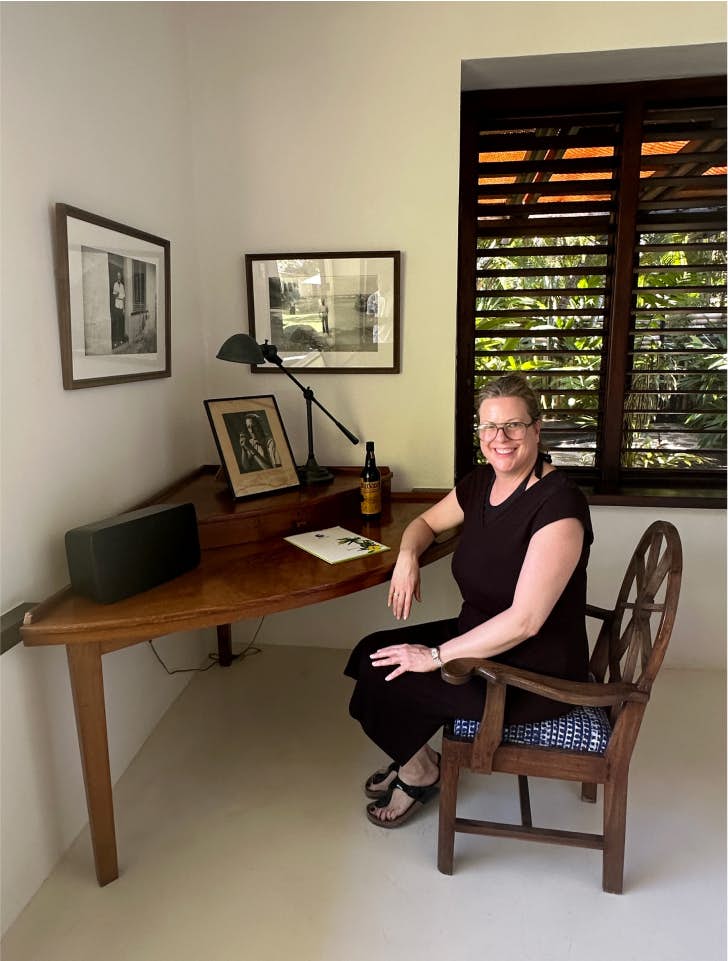 Brekke sitting at Ian Fleming's desk
