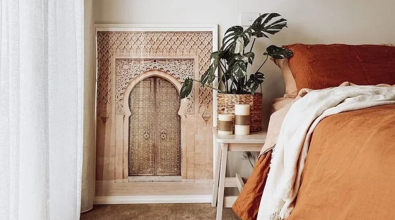 an image of a bedroom with a bed and a bench