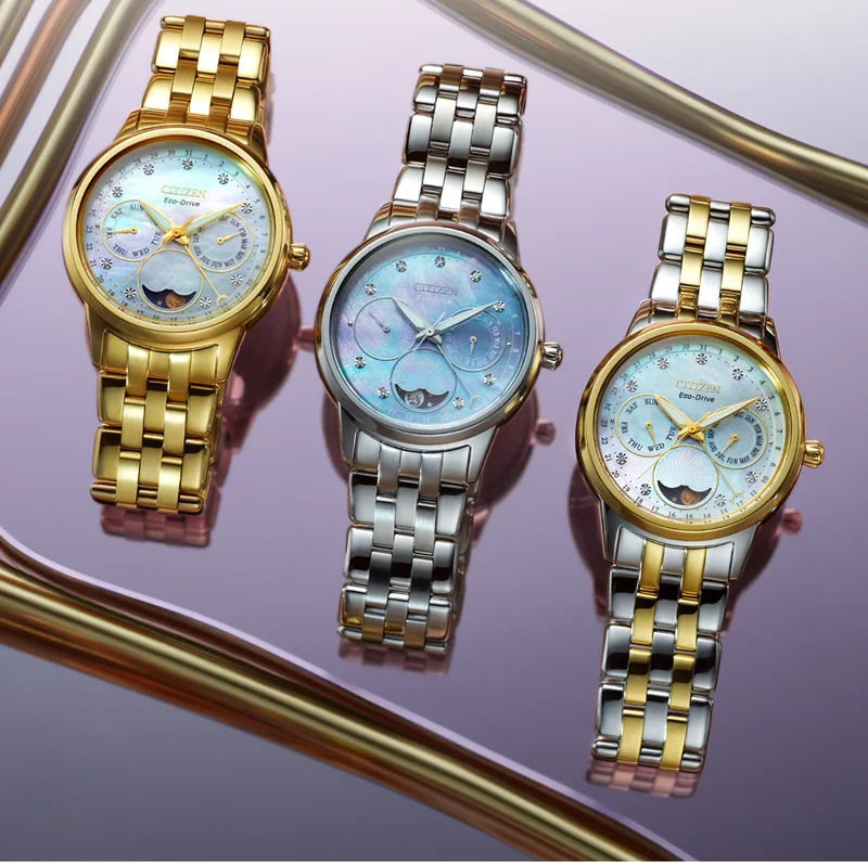 An array of the Calendrier watches, featuring the Mother-of-pearl dials.