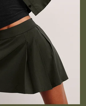 Score Pleated Skirt in Olive Ink