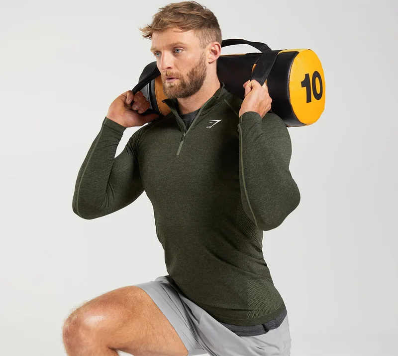VITAL 1/4 ZIP. Core Olive/Black.