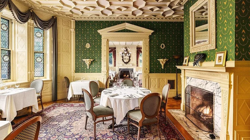 Image description: Dining room at The Inn at Erlowest, Lake George, New York.