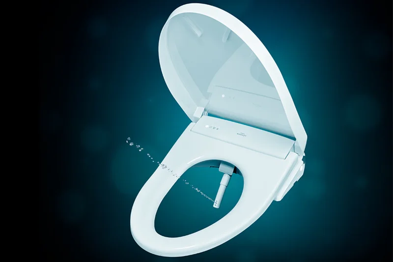 A WASHLET S7A bidet seat shown open displaying its warm water cleansing feature