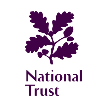 Logo of the National Trust featuring a purple oak branch with leaves and acorns.