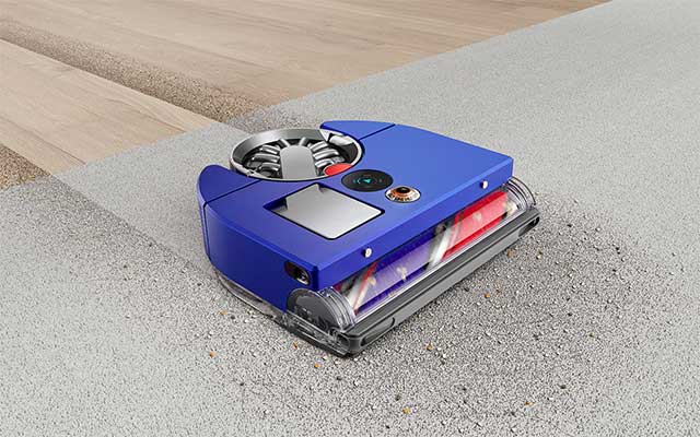 Dyson 360 Vis Nav robot sucking up debris on different floor types.