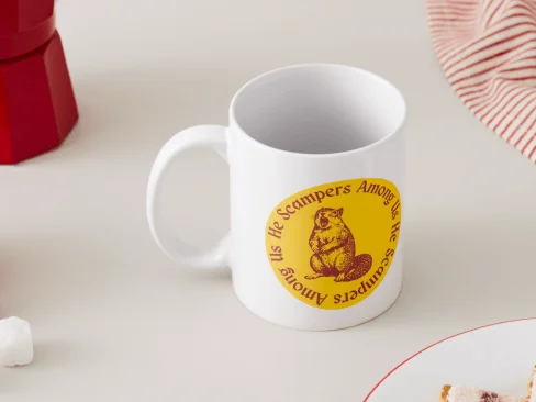 Yellow and brown illustrated squirrel mug