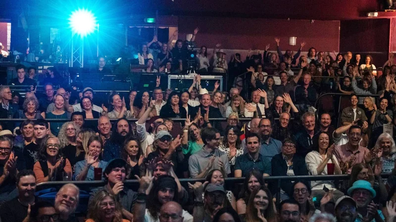 An audience claps after a screening An audience claps after a screening