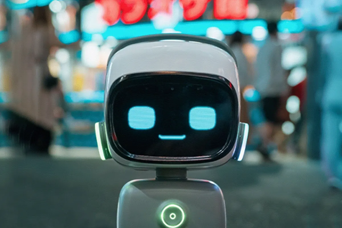 Norby, a friendly little robot working with children in a language lab.