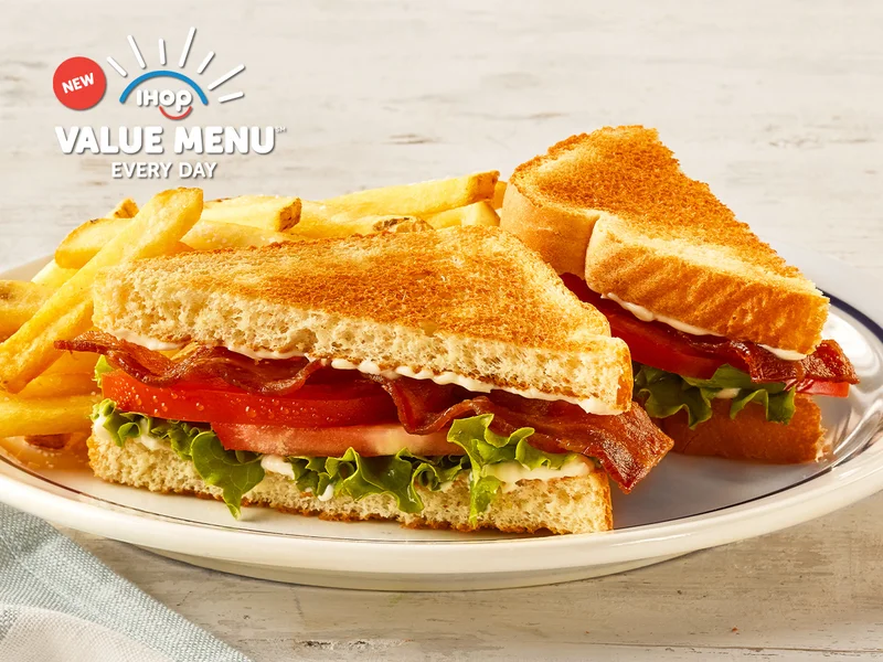The Value Menu BLT on a plate with fries.