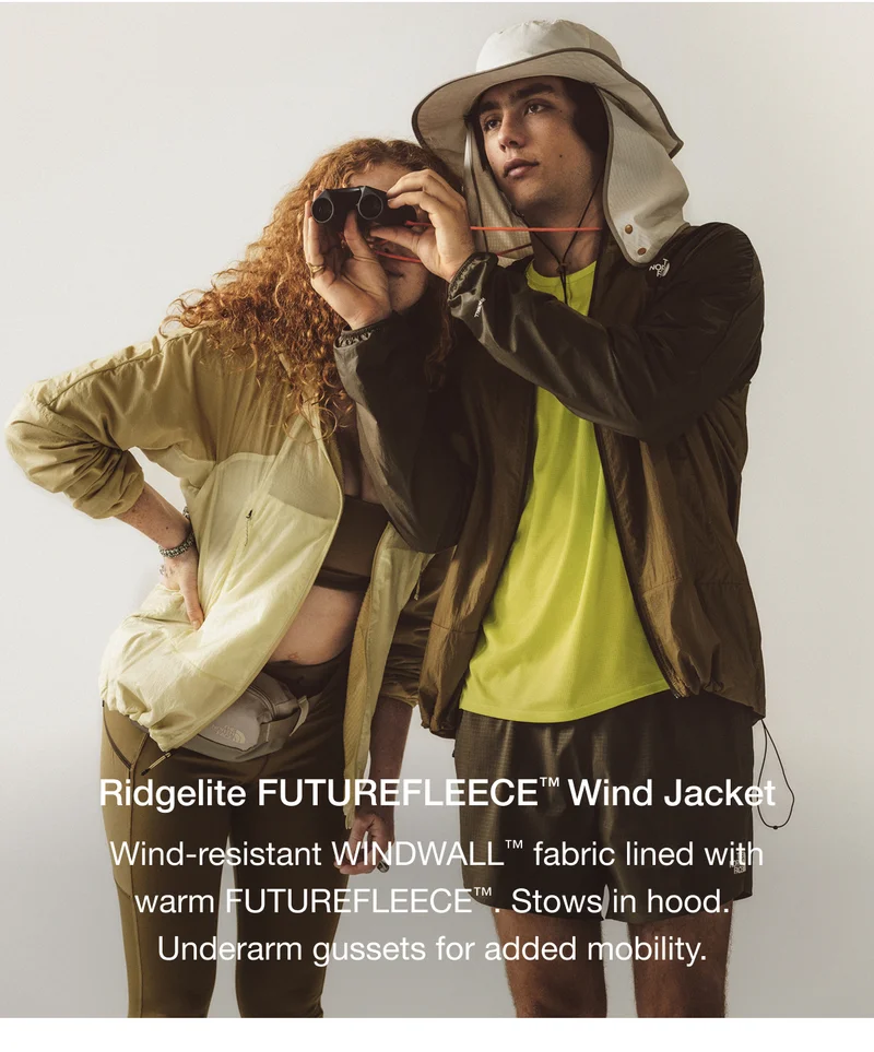 Ridgelite FUTUREFLEECE™ Wind Jacket Wind-resistant WINDWALL™ fabric lined with warm FUTUREFLEECE™. Stows/in hood. Underarm gussets for added mobility.