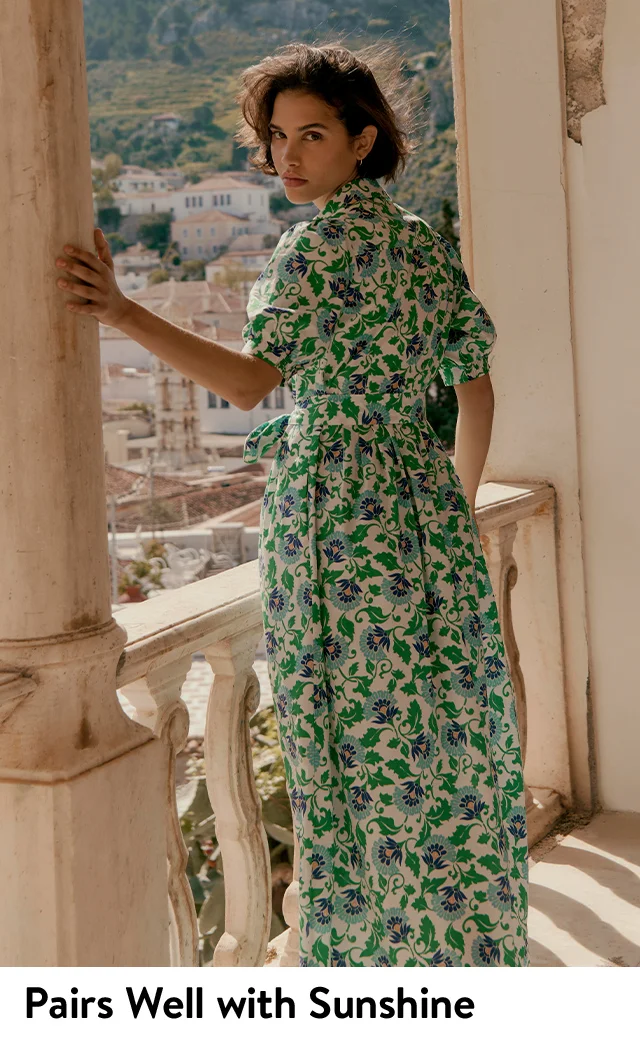 A woman wearing a floral-print dress.