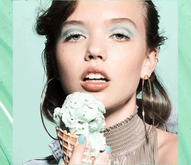 Model wearing Mint Melt Cooling Face Primer Model wearing Mint Melt Cooling Face Primer