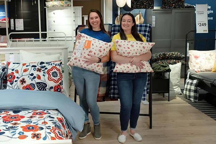 IKEA designers with bed textiles