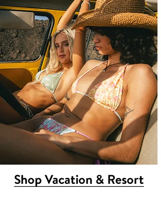 Two women wearing bikinis from Billabong.