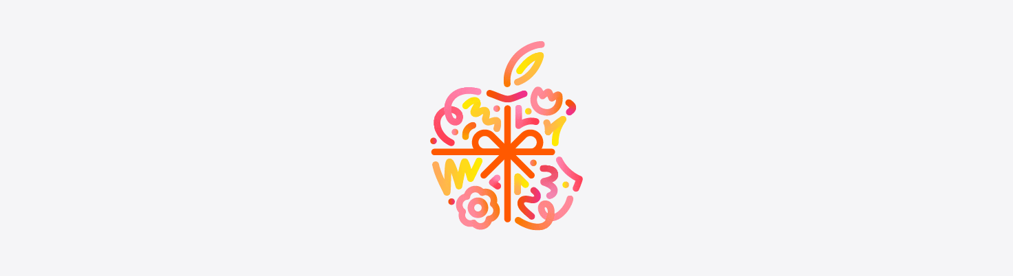 Dots, squiggles, spirals, and flower shapes in different hues of orange, pink, and yellow burst and spread across from behind Apple logo, wrapped in an orange color bow, made up of dots, squiggles, spirals, and flower shapes in different hues of orange, pink, and yellow