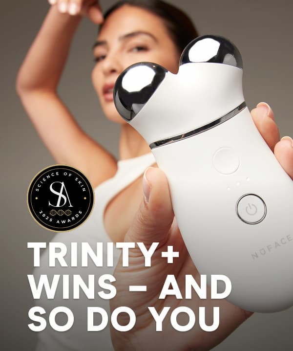 [Lifestyle Image] Model holding TRINITY+ smart device | TRINITY+ WINS – AND SO DO YOU
