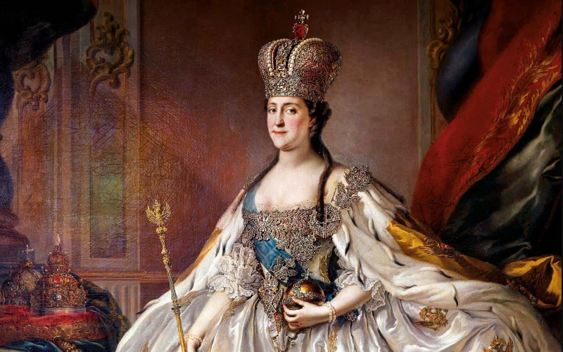 Catherine’s coronation portrait: Topped by a sparkling diamond crown, she displays the royal regalia and is draped with the blue sash of St. Andrew, the highest honor of the Russian Empire.