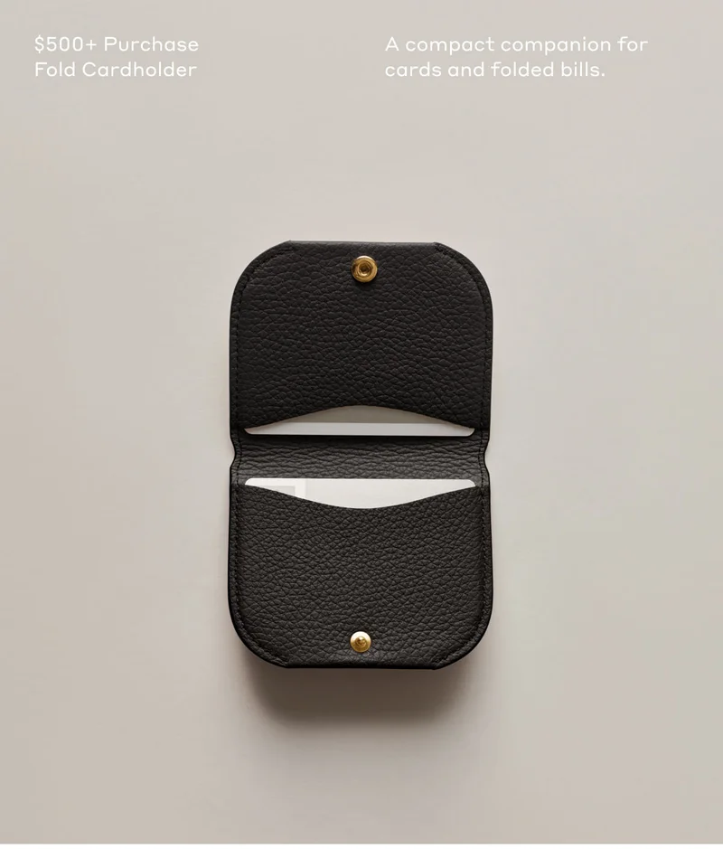 $500+ Purchase Cardholder A compact companion for cards and folded bills.