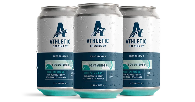 an image of three cans of athletic brewing on a white background