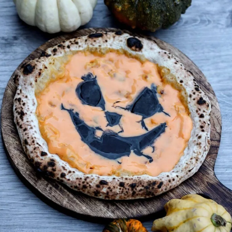 “Sweet but psycho” Custard and icing pizza by Scott Deley