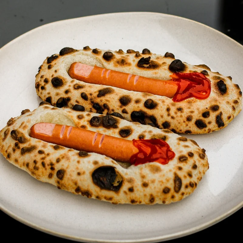 “Watch your fingers!” Pizza dogs