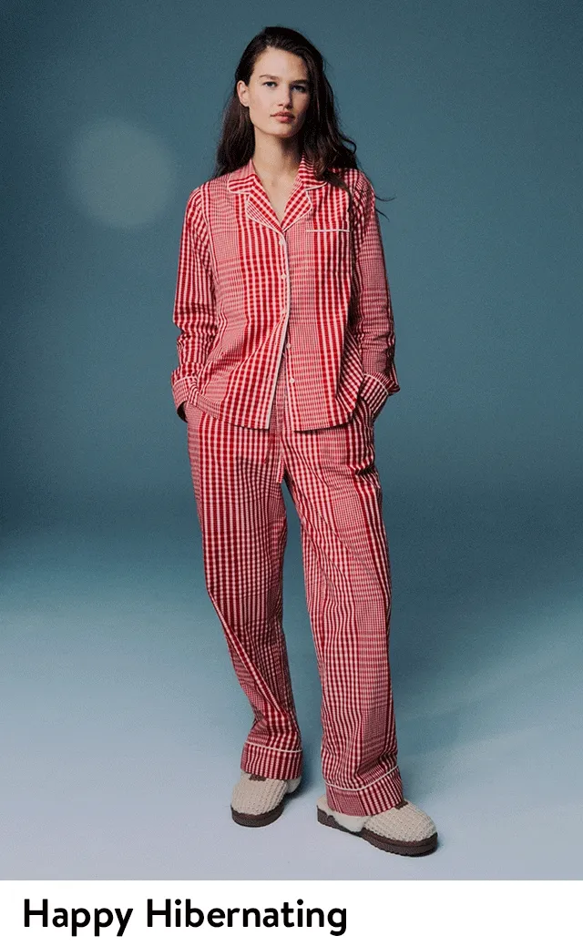 A woman wearing a pajama set.