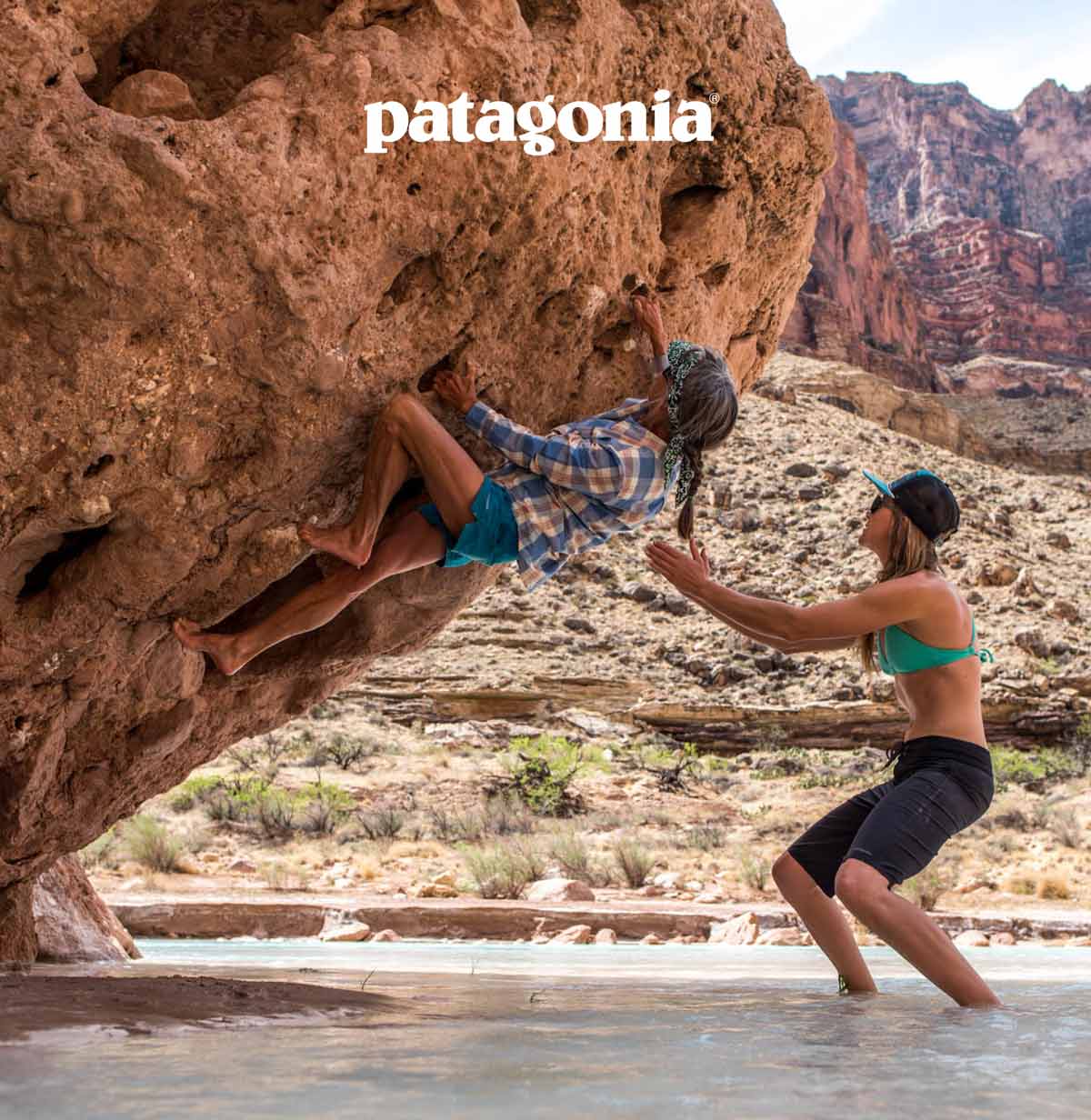 Patagonia. A person climbs a bouldering problem overhanging a creek.
