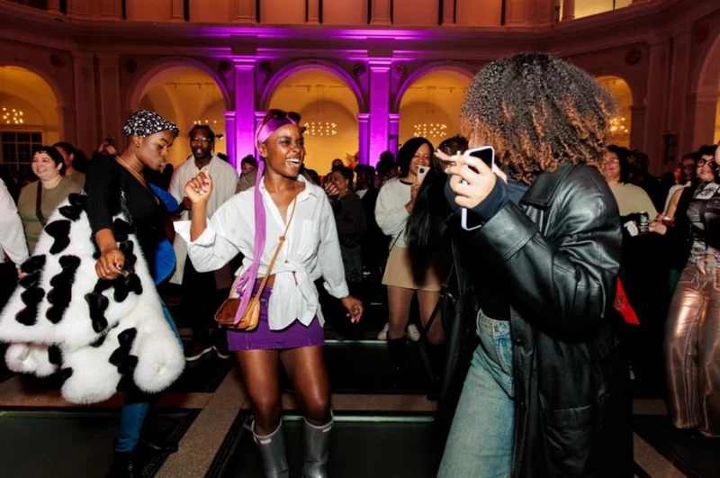 People smiling on a dance floor
