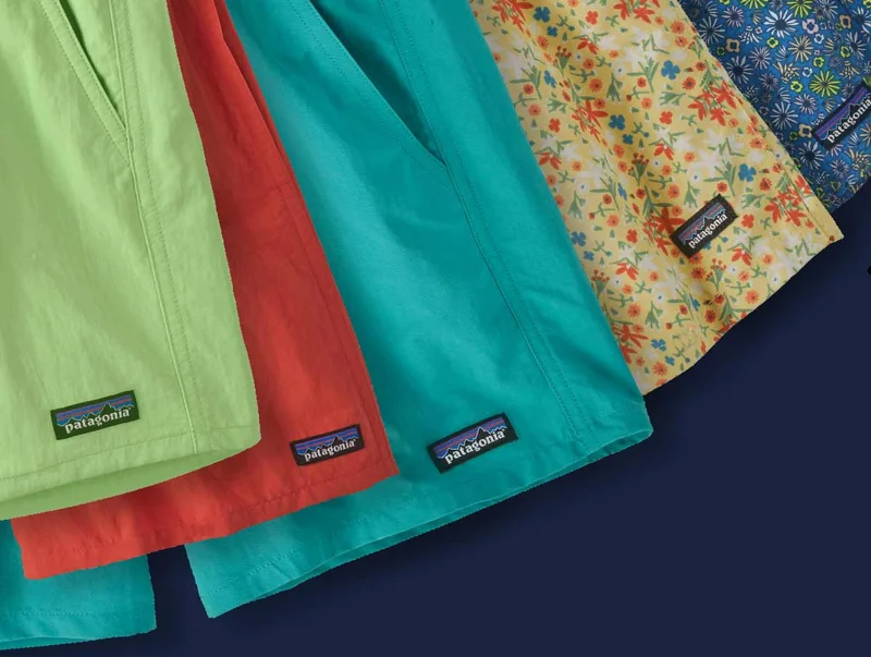 Many pairs of Baggies laying in a fan-shape to show off their colorful hems.