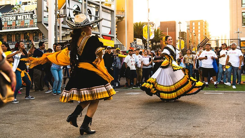 Image description: Dancers perform in Gallagher Square, San Diego, California.