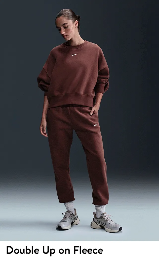 Women wearing matching sweatshirts and sweatpants from Nike.
