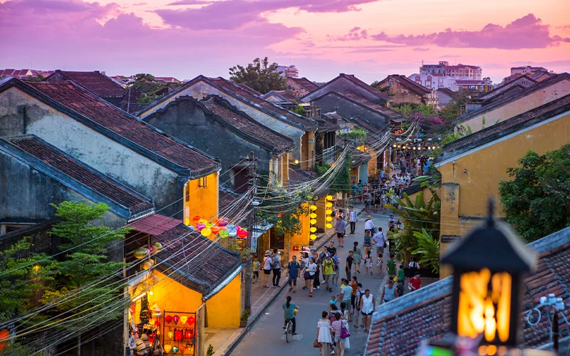Pedestrians stroll through the old town in Hội An, Vietnam. A river trading port from the 15th through 19th centuries, it’s one of many destinations around the globe that ban or severely limit cars.