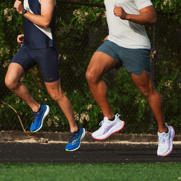 Two men running on a track