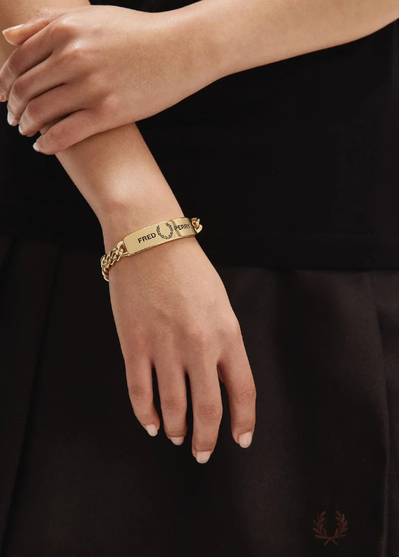 Gold Fred 'laurel' Perry branded ID bracelet