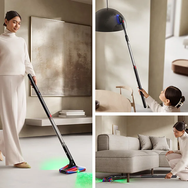 A woman using the Dyson PencilVac cleaner all around her home