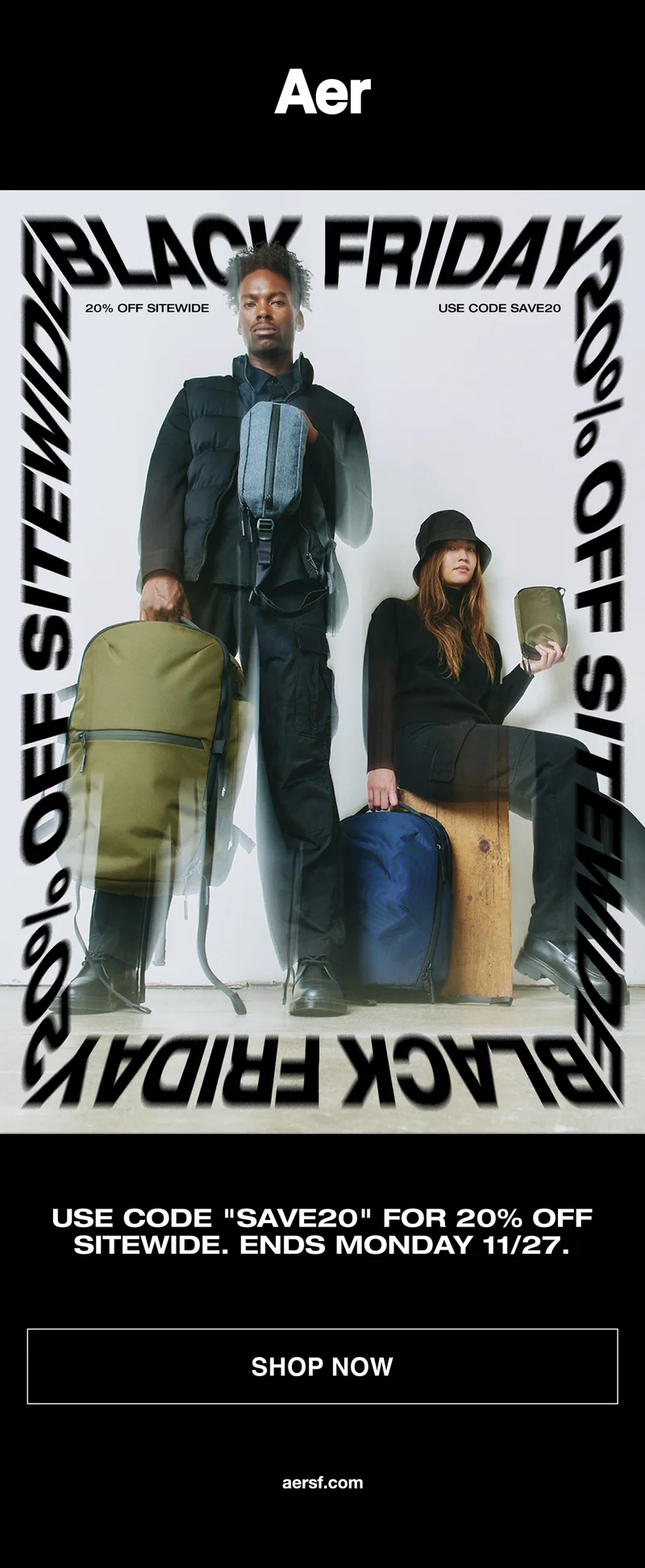 A man and woman holding modern bags and backpacks for the Aer Black Friday Sale