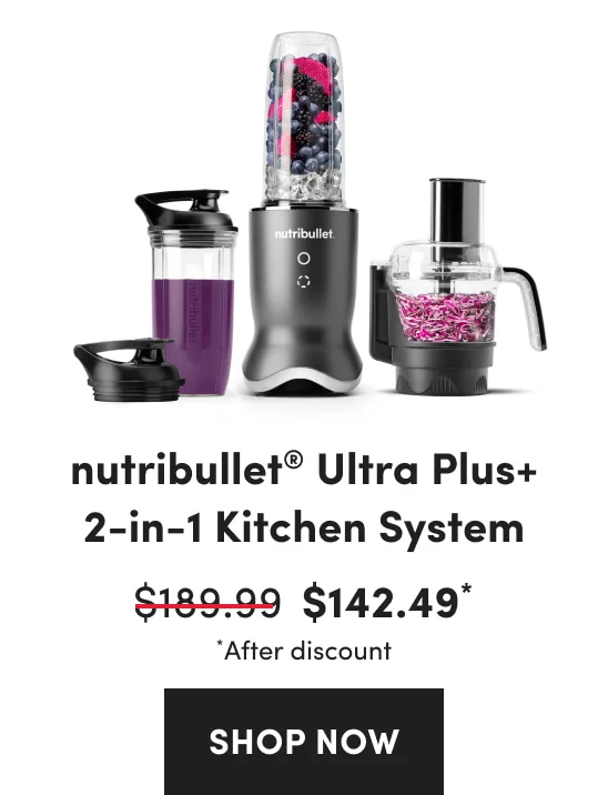 A collection of dark grey kitchen blenders and a food processor filled with berries, ice, and chopped purple vegetables.