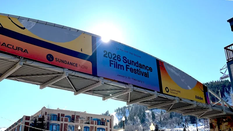 View of Main Street featuring an official 2026 Sundance banner hanging
from a bridge overhead.