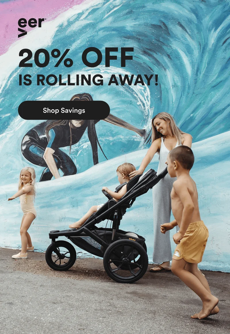 a mother with her kids using veer switch &roll stroller