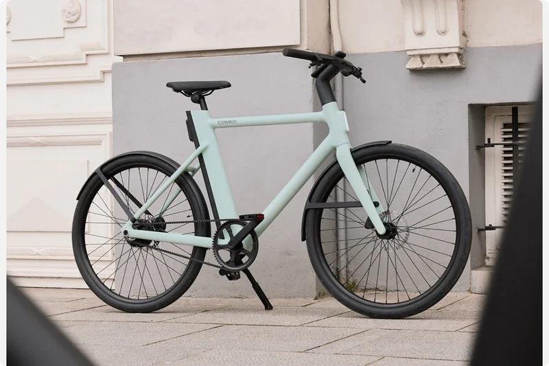 A photograph. A Cowboy Cruiser Mint model is shown from a low front right angle.